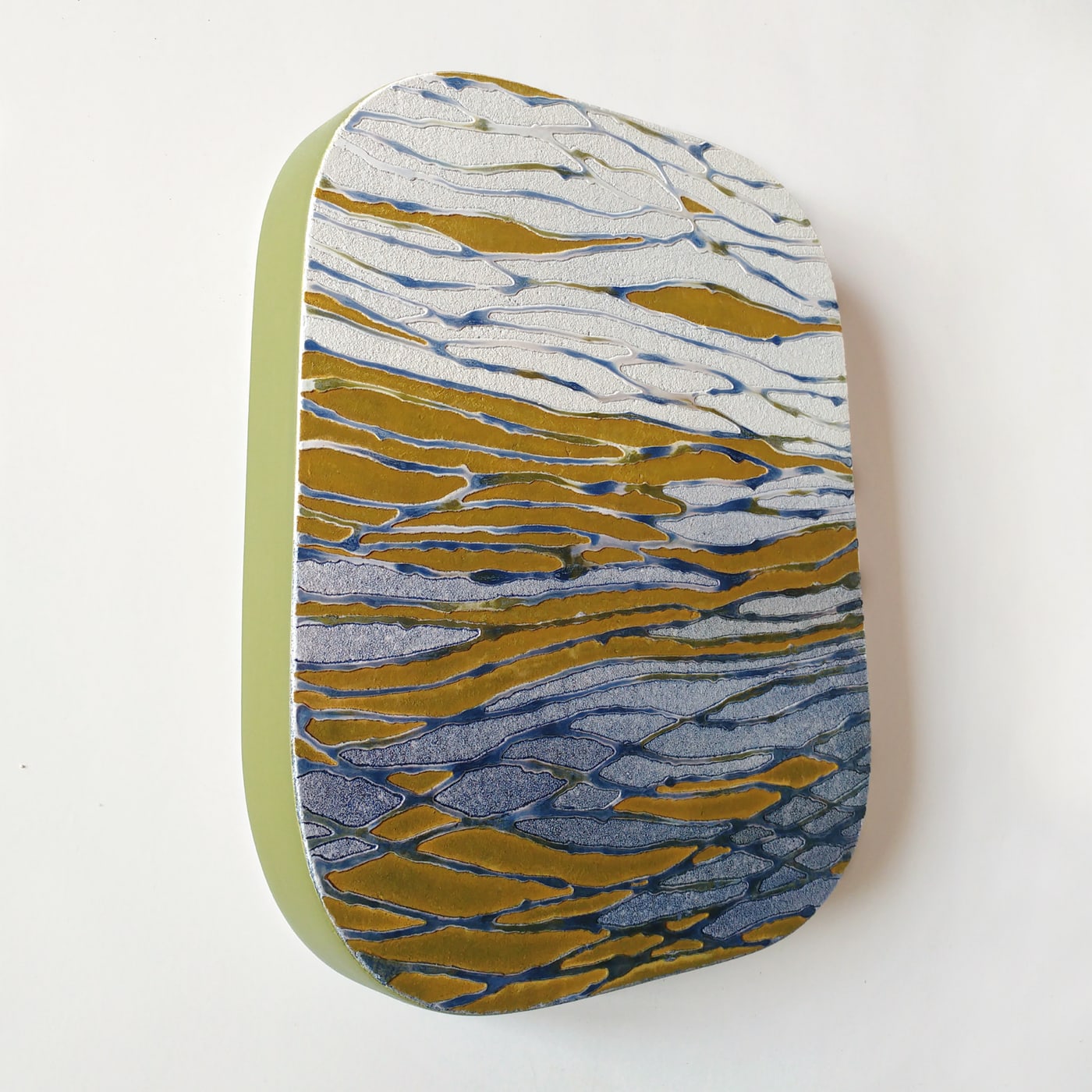 Oeuvre de Aude Arnold, artiste sgraffito, enduit chaux